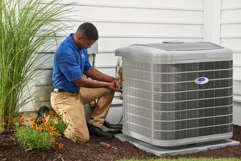 photo of Carrier Dealer Servicing Outdoor Unit