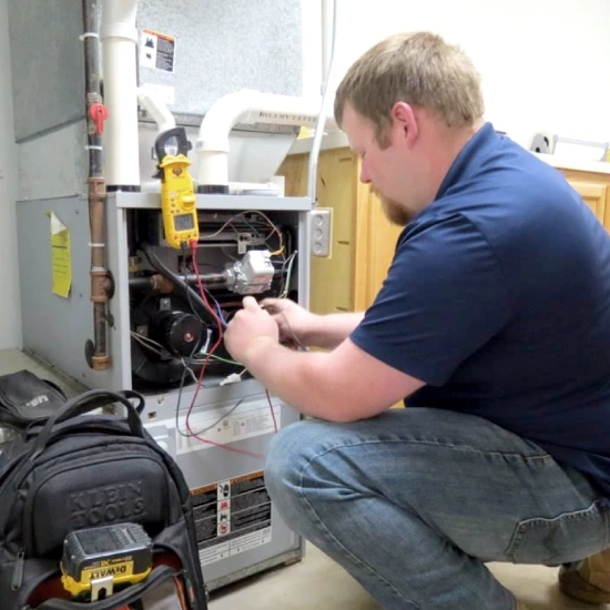 picture of TECHNICIAN PERFORMING HVAC TESTING